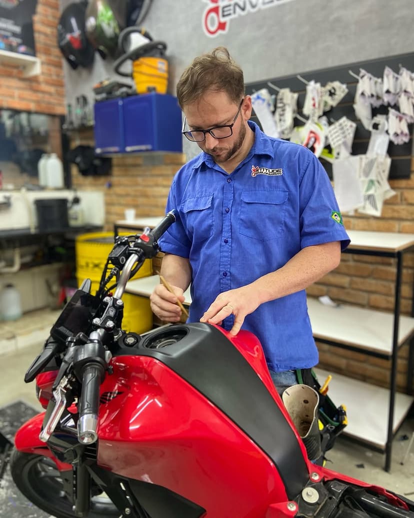 A sleek motorcycle with a custom wrap.