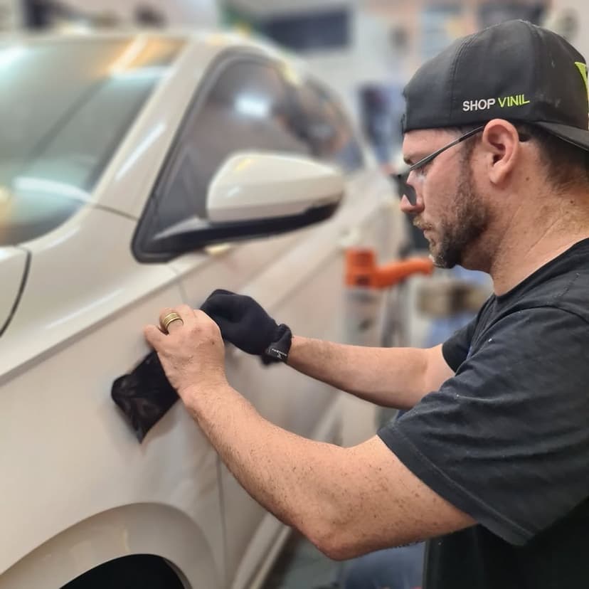 Detailed view of a car wrapping process.